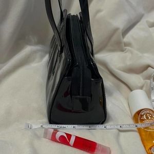 xoxo new york shiny sleek black mini purse